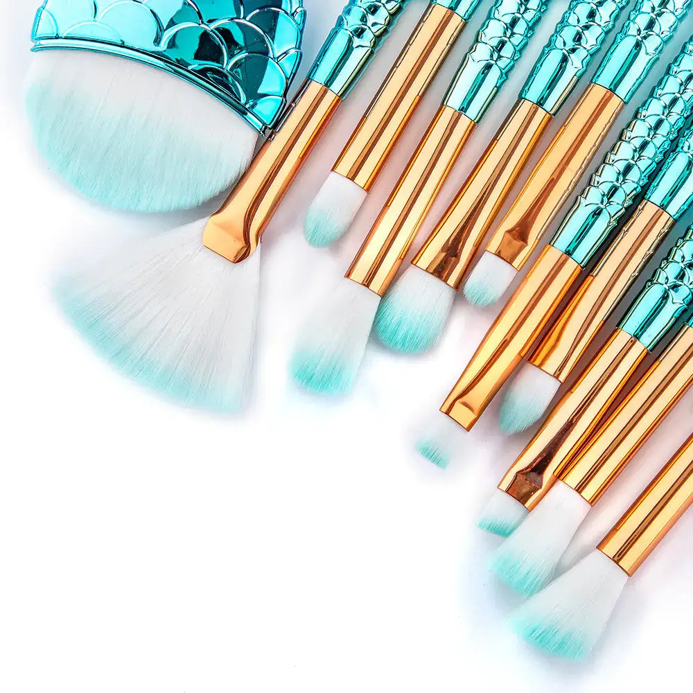 11-piece mermaid tail eye makeup brush set with gradient tail design in turquoise and gold